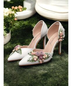 Women's White Wedding Heels with Floral Embellishments - Elegant Pointed Toe Design, Ankle Strap, and Stiletto Heel, Perfect for Bridal and Special Oc